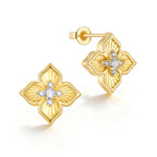 14K Gold PVD four leaf clover stud earrings with sparkling CZ stones and intricate diamond-cut floral details on a white background.