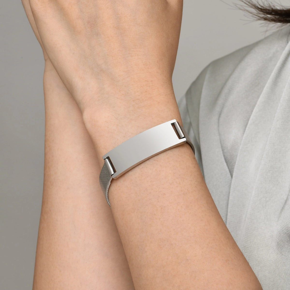 Stainless steel medical alert mesh bracelet worn on wrist