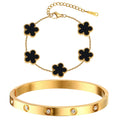 Two-piece gold tone bracelet set featuring five black acrylic flower charms and a polished stainless steel bangle with sparkling crystal accents.