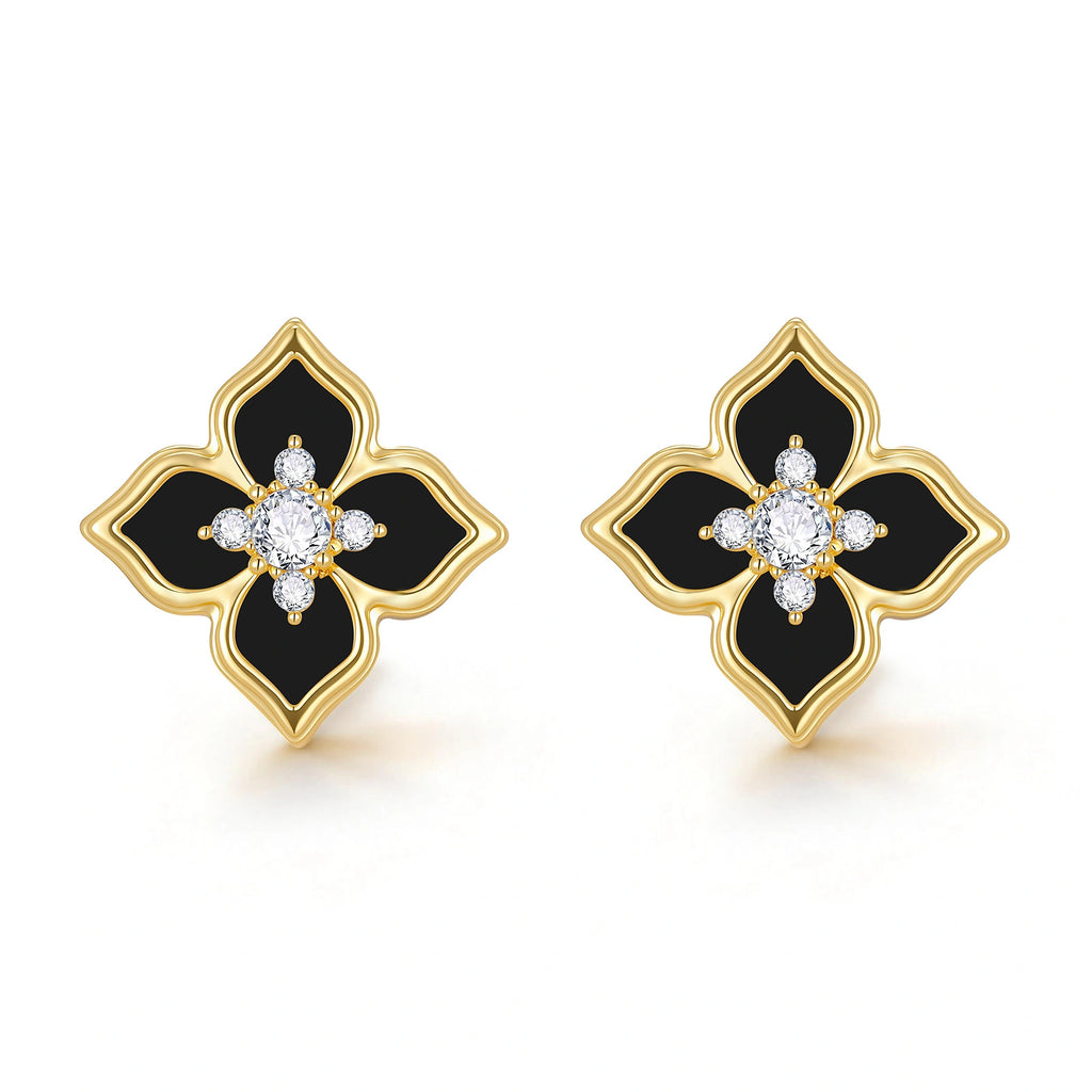 Front view of a pair of black four leaf clover stud earrings featuring glossy acrylic petals, polished gold edges, and CZ stone accents.