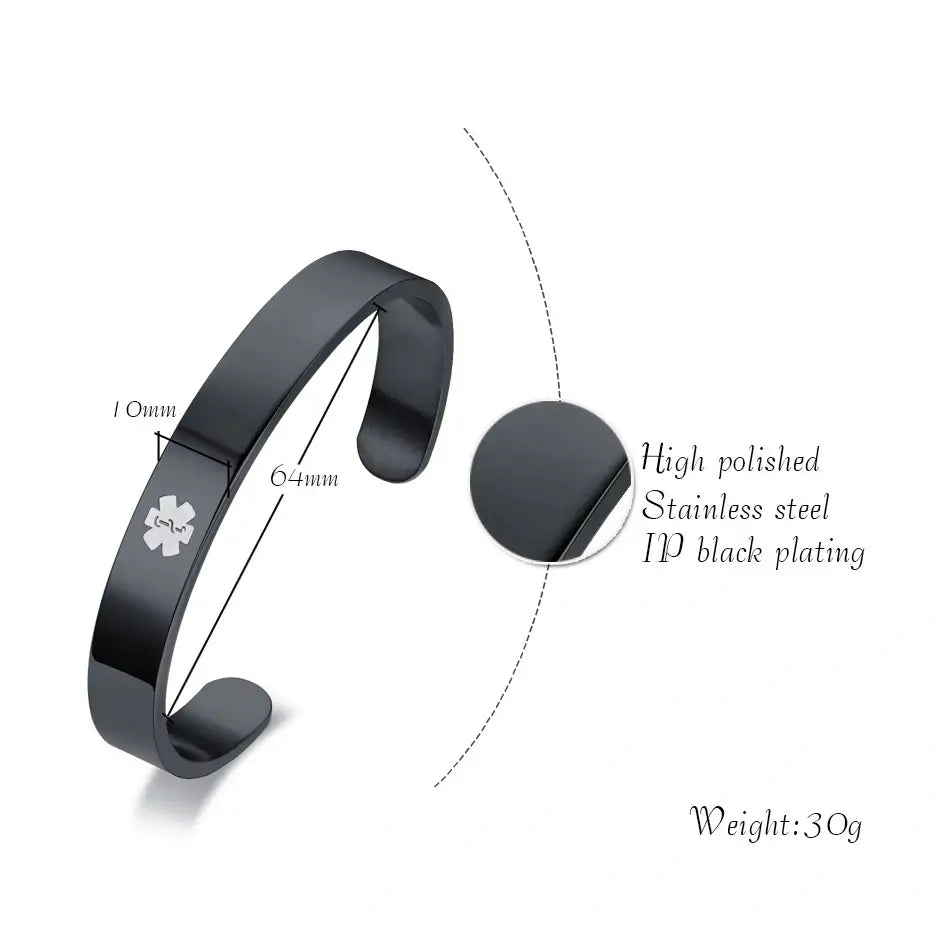 Black medical ID cuff bangle detail showing the stainless steel body and personalized engraving area.