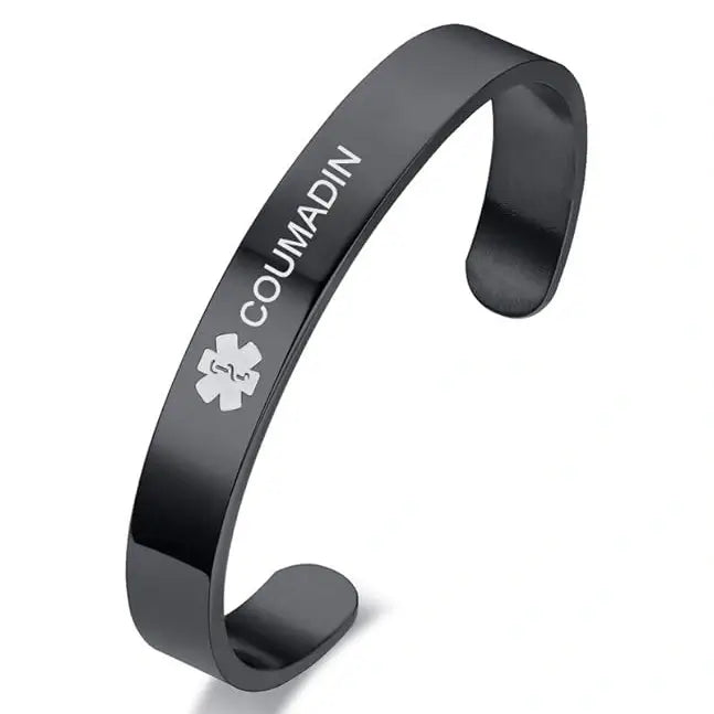 Black personalized stainless steel medical ID cuff bangle with custom engraving on the front.