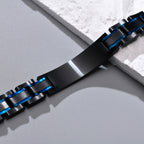 Close-up of the black medical ID plate and blue accent links on a stainless steel bracelet.