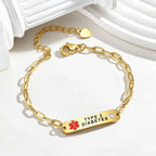 Gold Type 2 Diabetes medical ID bracelet with CZ accents, heart charm, and engraved identification plate.