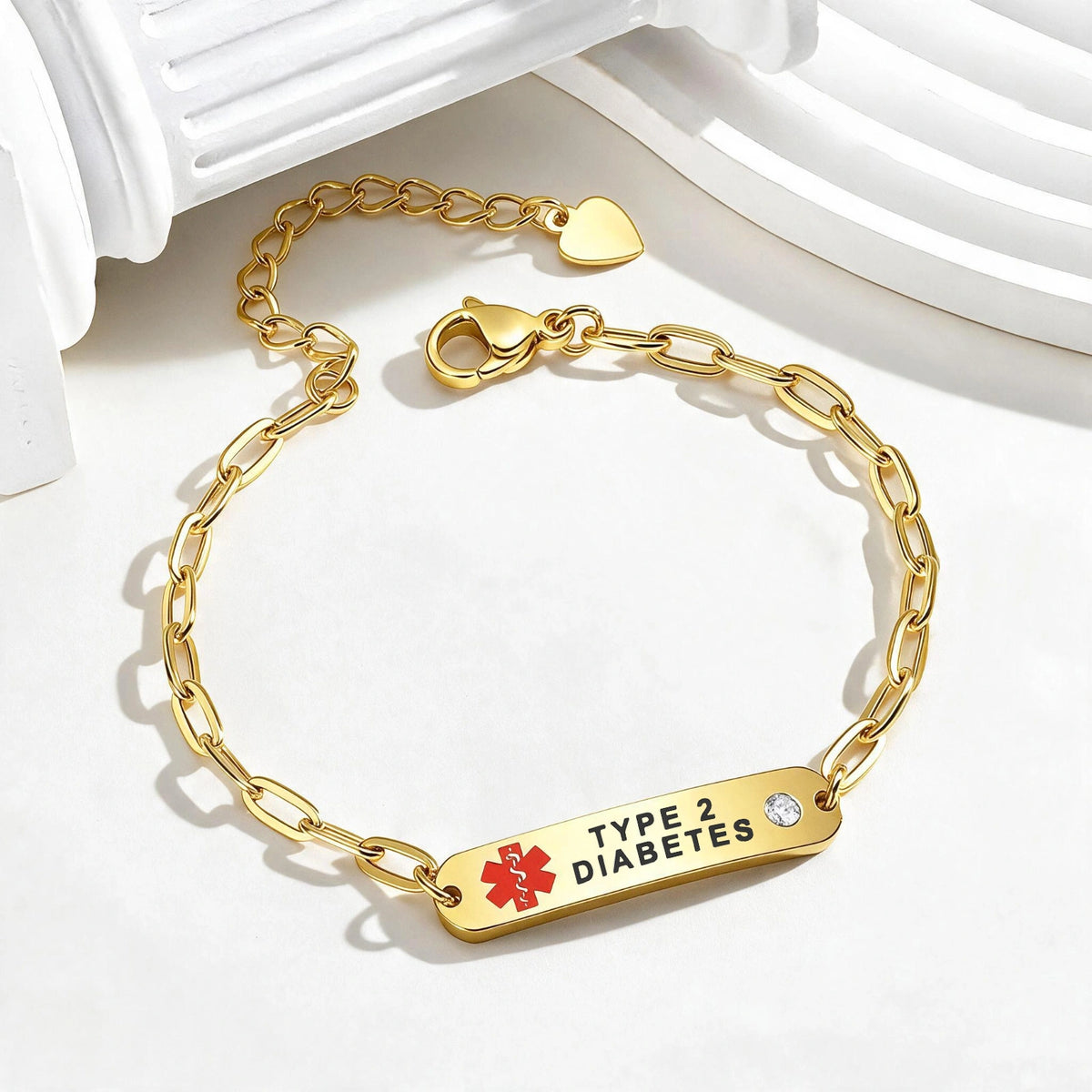Gold Type 2 Diabetes medical ID bracelet with CZ accents, heart charm, and engraved identification plate.