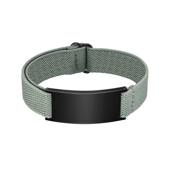 Green personalized medical ID bracelet with adjustable elastic band and black stainless steel engraving plate.
