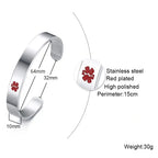 Silver stainless steel medical alert cuff bangle showing the engraving area and red medical symbol.
