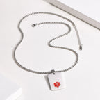 Silver stainless steel medical ID dog tag necklace with chain and personalized pendant.