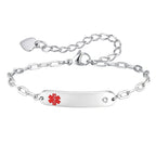 Silver personalized women's medical ID bracelet with CZ accents, engraving plate, and red medical symbol.
