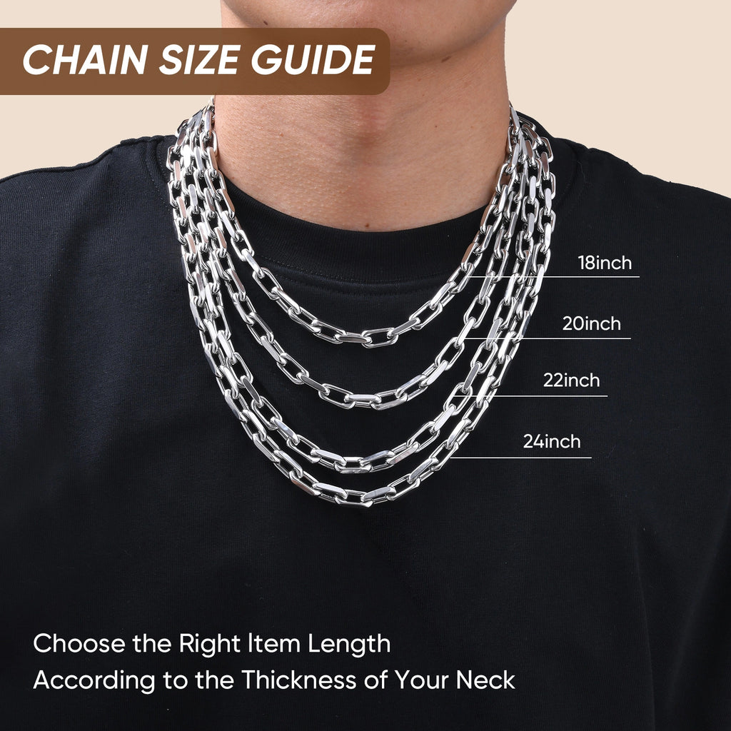 Model wearing layered stainless steel rectangular link necklaces in three different lengths, showing how each chain sits around the neck.