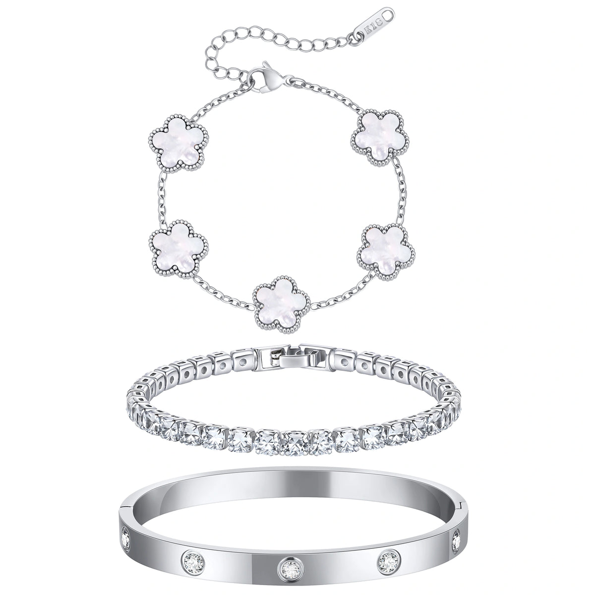 Three-piece silver tone bracelet set featuring five white mother of pearl flower charms, a sparkling CZ tennis bracelet, and a stainless steel crystal bangle.