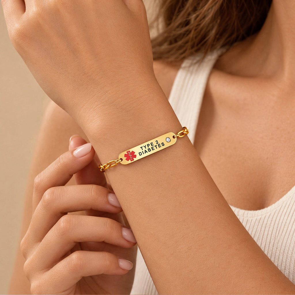 Woman wearing a gold Type 2 Diabetes medical ID bracelet with CZ accents and engraved ID plate.